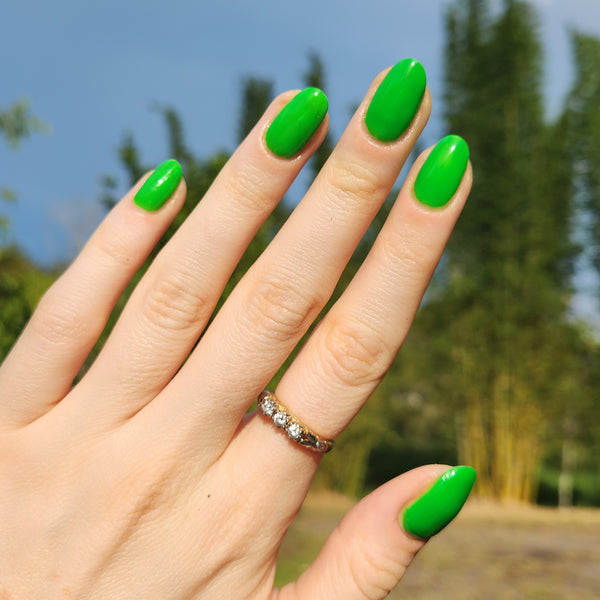 Hand showing Lime colour on nails